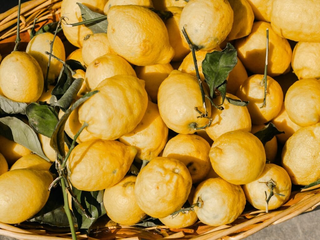 yellow fruits on brown basket